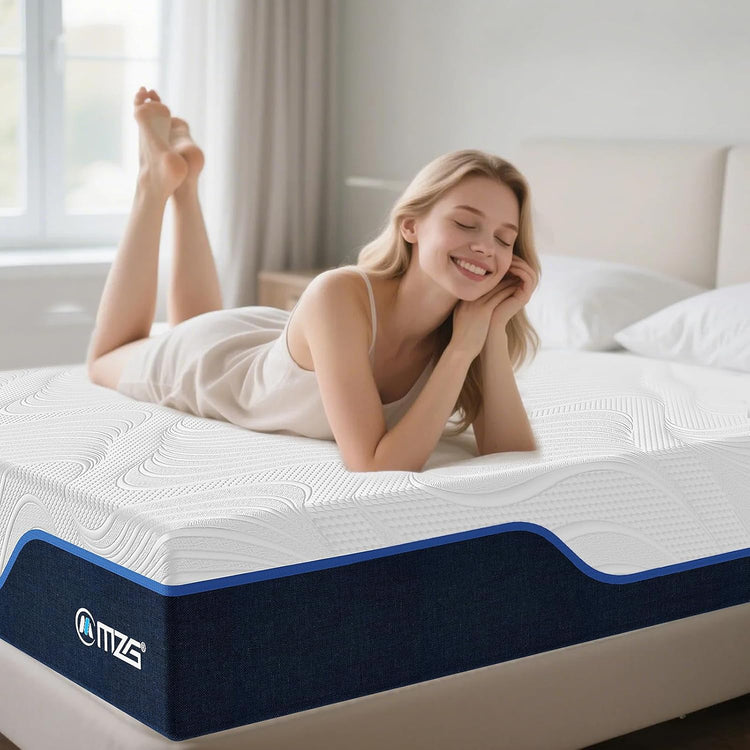 Woman lying on a mattress with a visible brand logo in a bright bedroom.