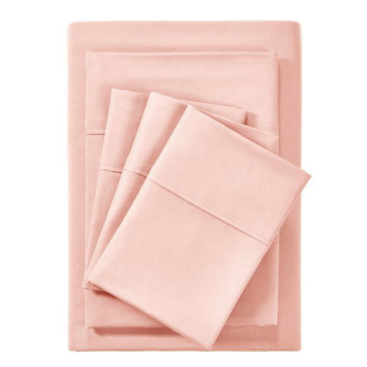 Set of pink bed sheets and pillowcases on a white background