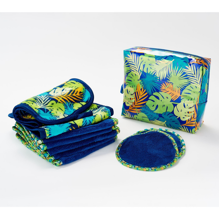 Set of reusable pads with a tropical leaf pattern on a white background