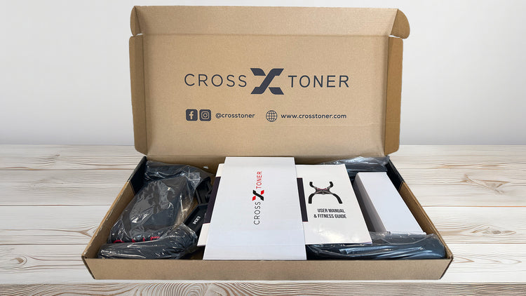 Open cardboard box containing Cross X Toner products on a wooden surface.
