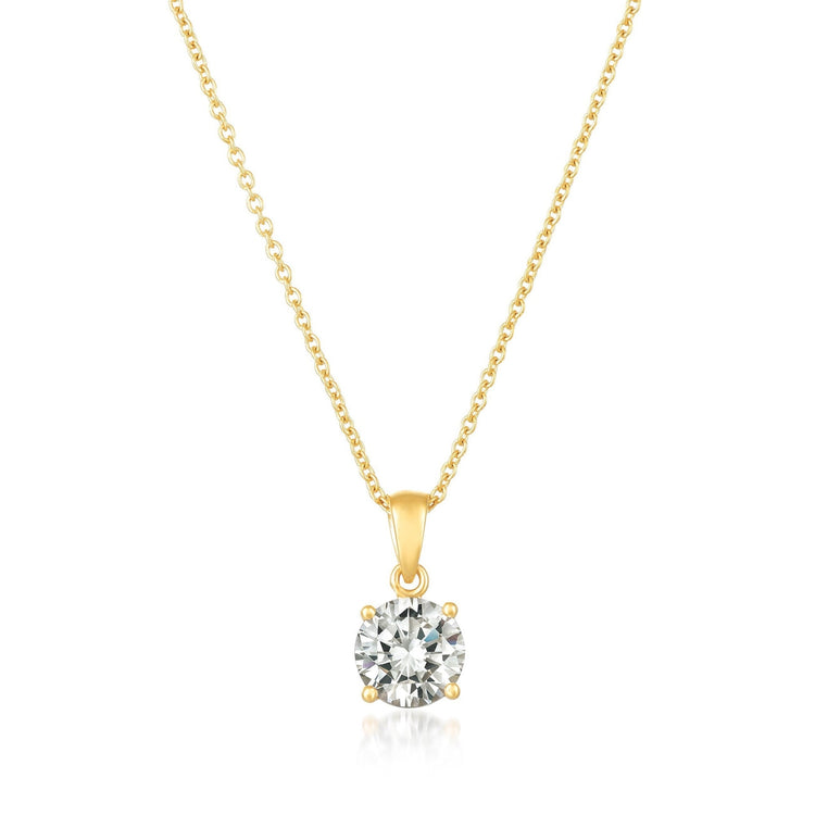 Gold necklace with a diamond pendant on a white background