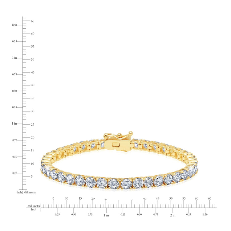 Gold bracelet with diamonds on a white background with measurement scale