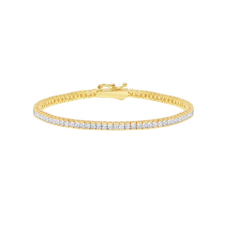 Gold bracelet with diamonds on a white background