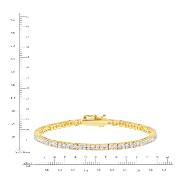 Gold bracelet with diamonds on a white background with measurement scale