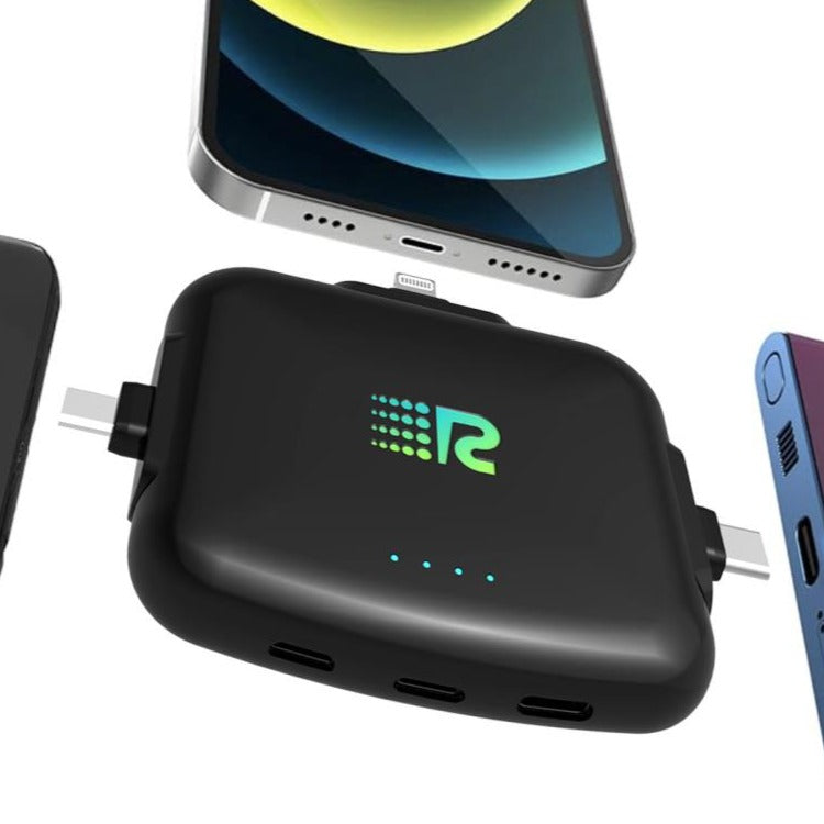 Black multi-port charging hub with smartphone and tablet on a white background
