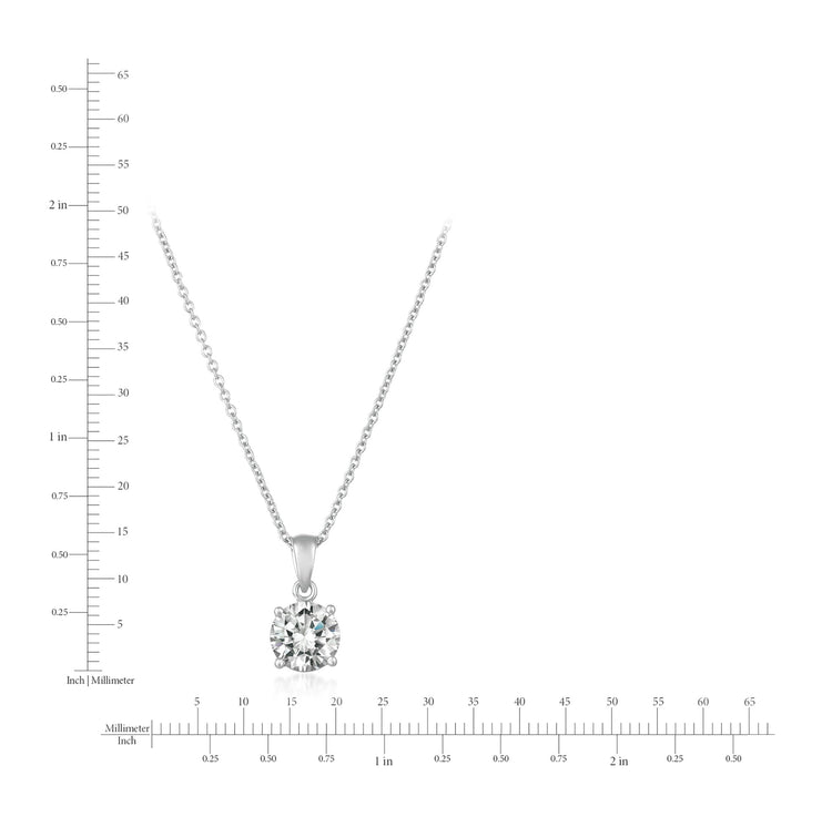 Silver necklace with a diamond pendant on a white background with measurement scale.