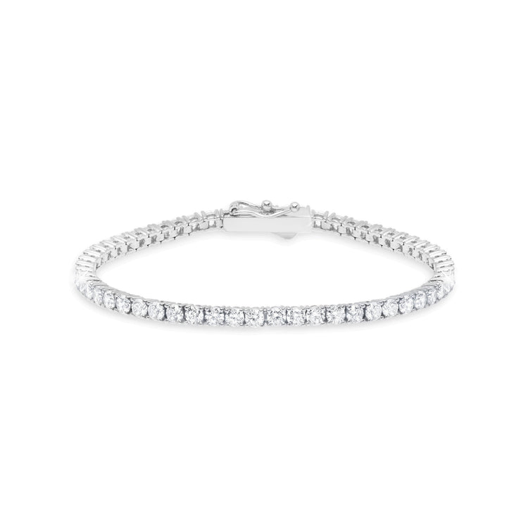 Silver bracelet with clear stones on a white background