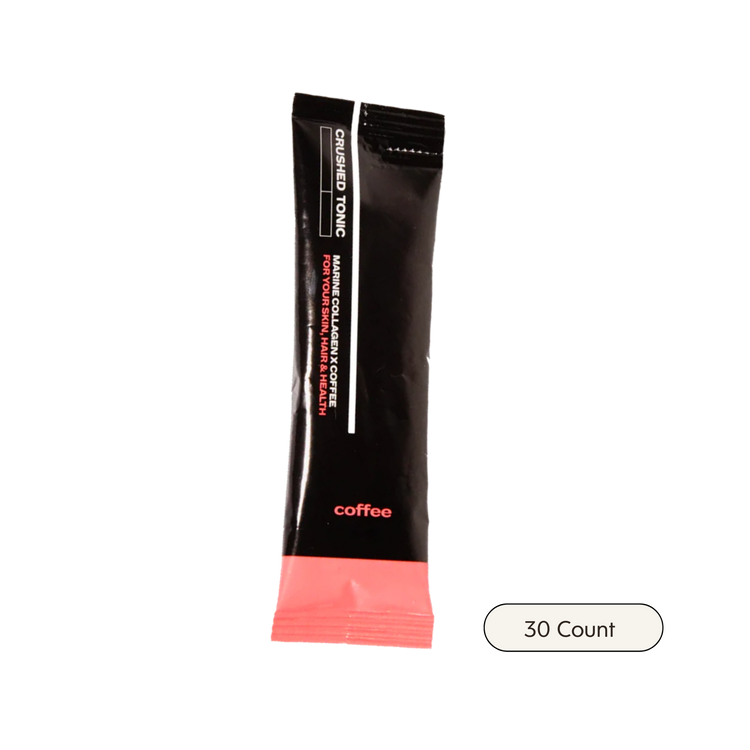 Black and pink coffee packaging with text on a white background