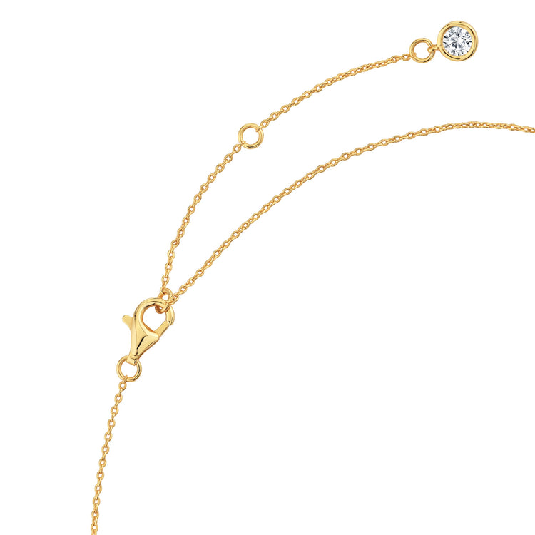 Gold necklace with a clasp on a white background