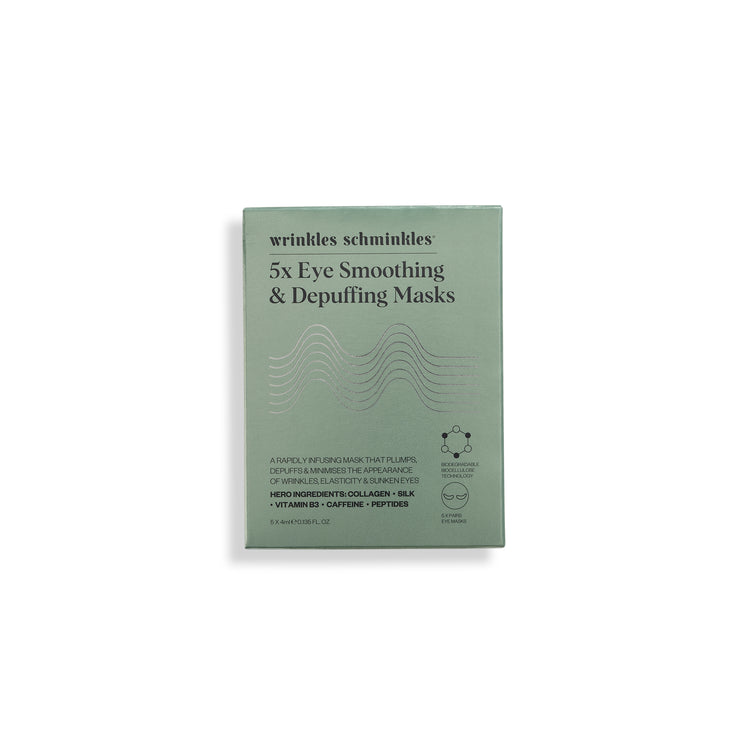 A packaged sheet mask product labeled 'wrinkles schminkles 5x Eye Smoothing & Depuffing Masks'.