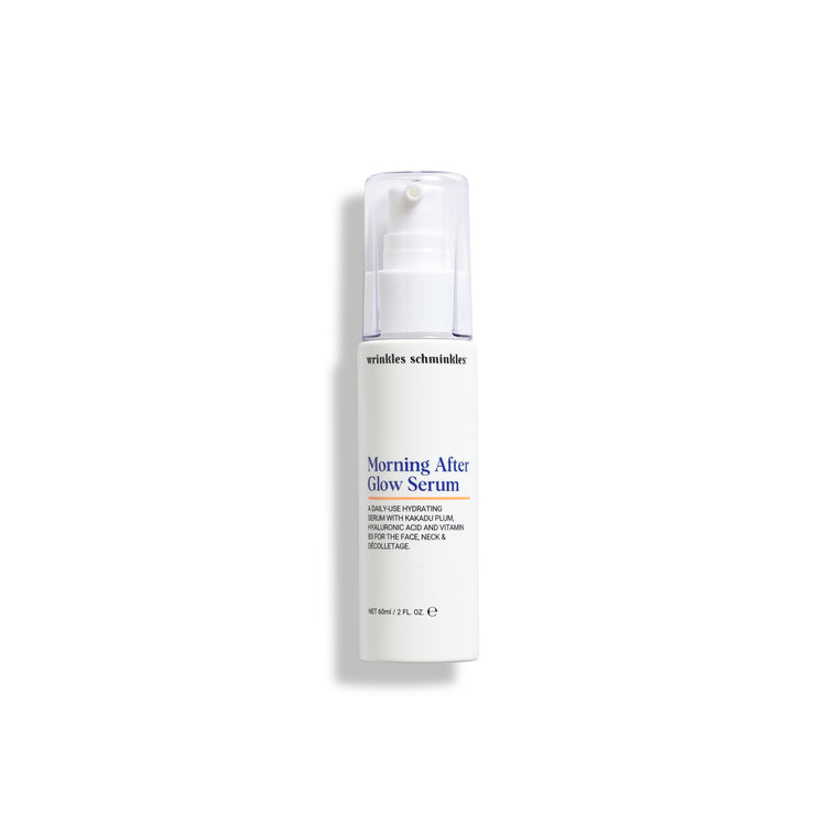 A white pump bottle labeled 'Morning After Glow Serum' from the brand wrinkles schm wrinkles.