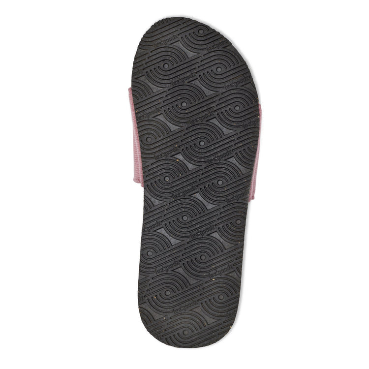 Black sandal sole with wavy pattern on a white background