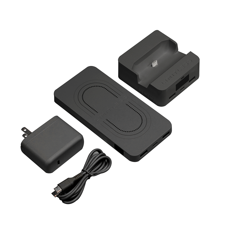 Set of black electronic components including a charger, cable, and two dock-like devices on a white background.