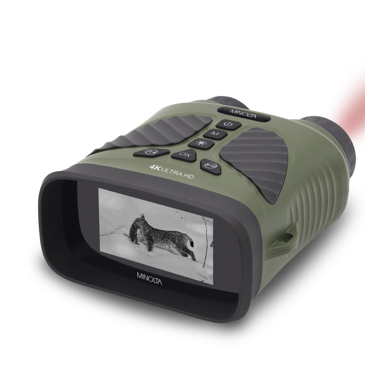 Green and black Minolta digital camera with screen displaying an animal image on a white background