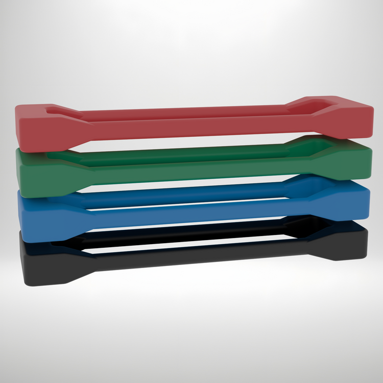 Stack of colorful plastic trays on a white background