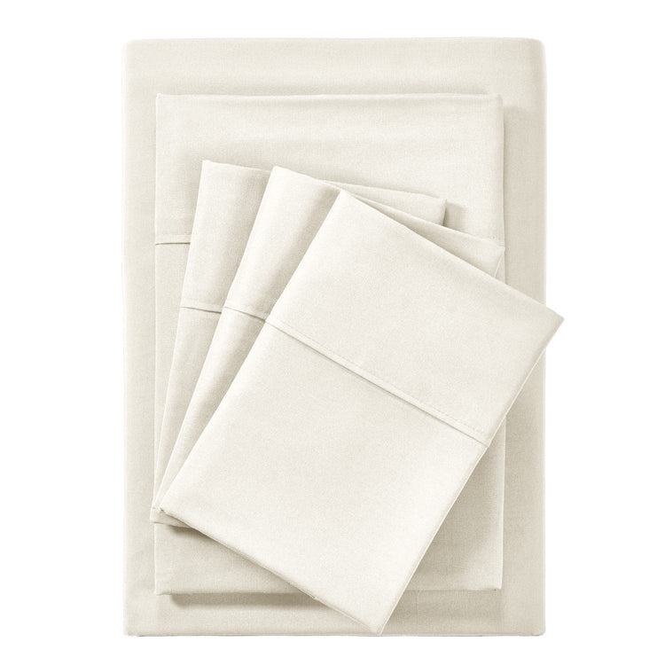 Set of white folded bed sheets on a white background