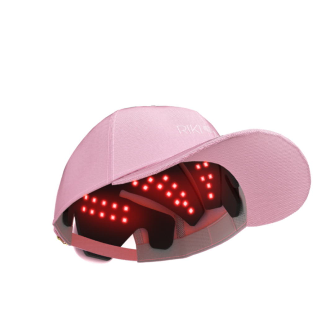 Pink cap with LED lights on a white background