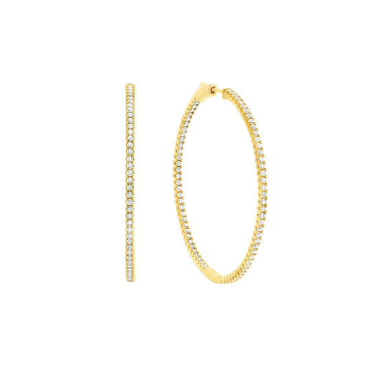 Gold hoop earrings with embedded diamonds on a white background