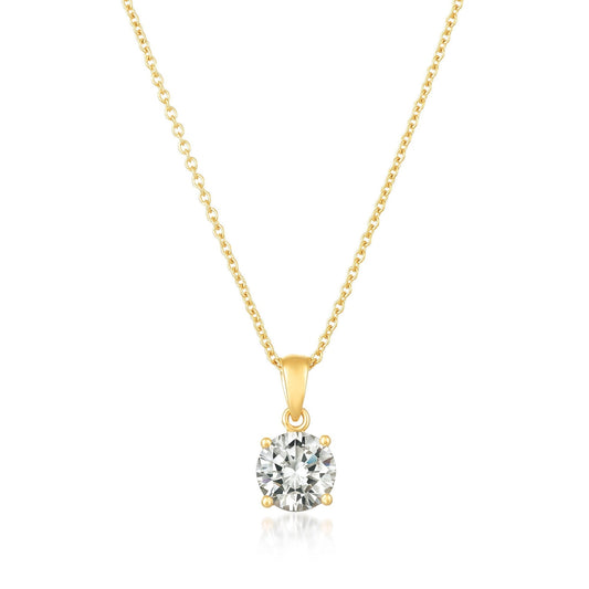 Gold necklace with a diamond pendant on a white background