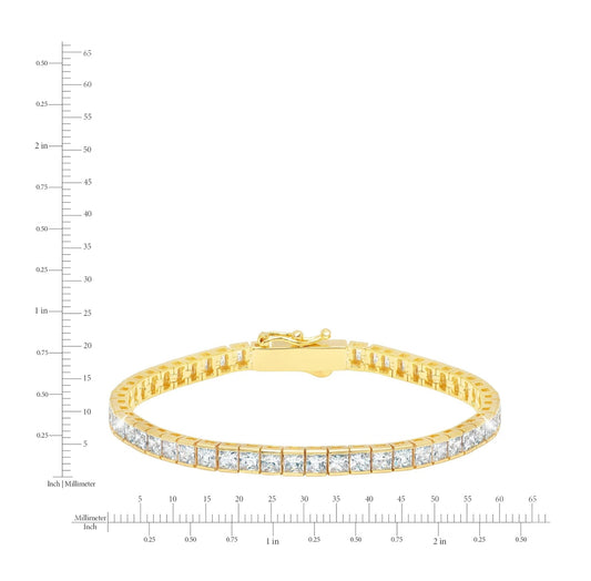 Gold bracelet with clear gemstones on a white background