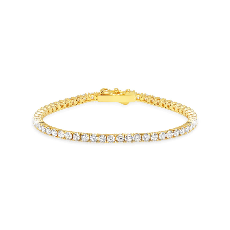 Gold bracelet with clear stones on a white background