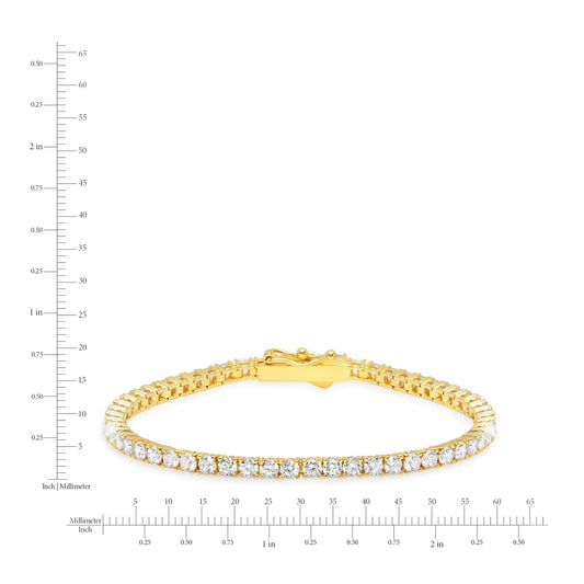 Gold bracelet with clear stones on a white background