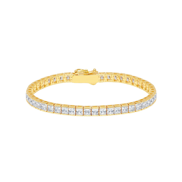Gold bracelet with diamond accents on a white background