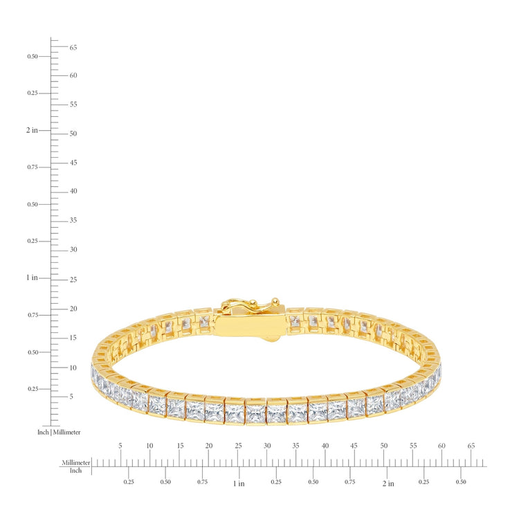 Gold bracelet with diamonds on a white background with measurement scale
