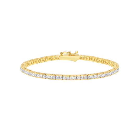 Gold bracelet with diamonds on a white background
