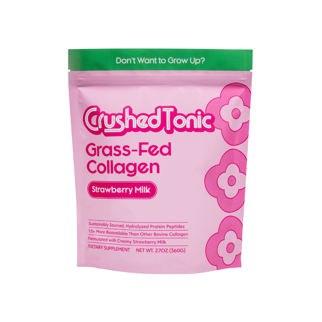 Pink package of Crushed Tonic Grass-Fed Collagen Strawberry Milk flavor on a white background