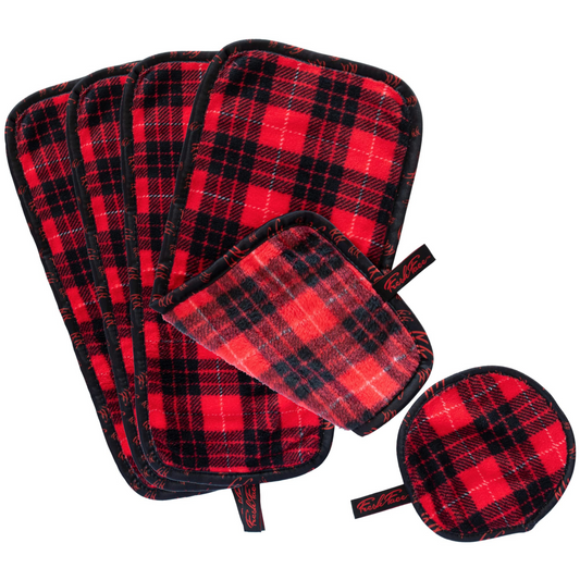 Set of red and black plaid pot holders and oven mitts on a white background
