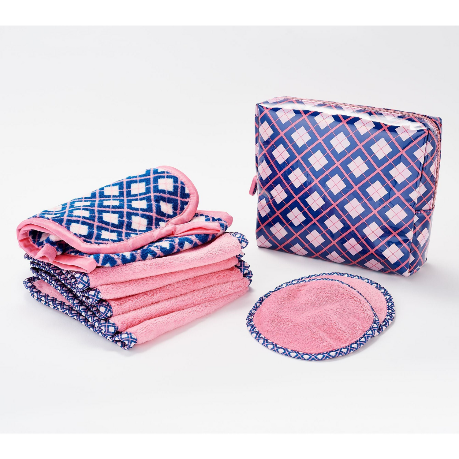 Set of pink and blue patterned reusable pads with a storage bag on a white background