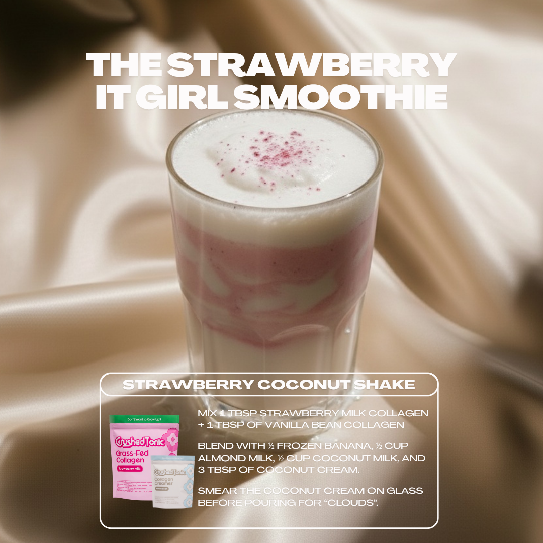 Strawberry smoothie in a glass with a creamy texture, set against a soft beige fabric background.