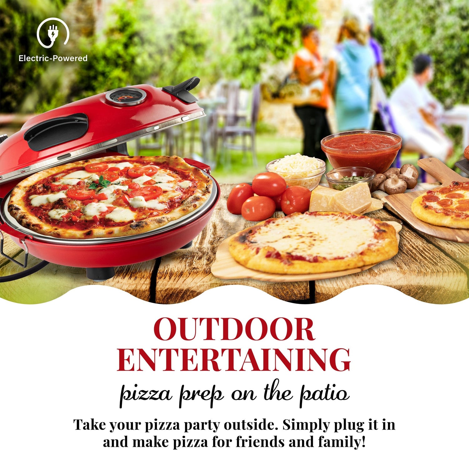 Red electric pizza oven with pizzas on a patio setting, people in the background