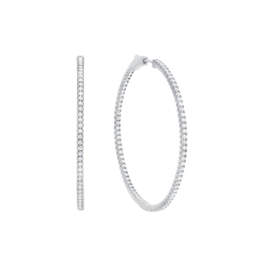 Silver hoop earrings on a white background