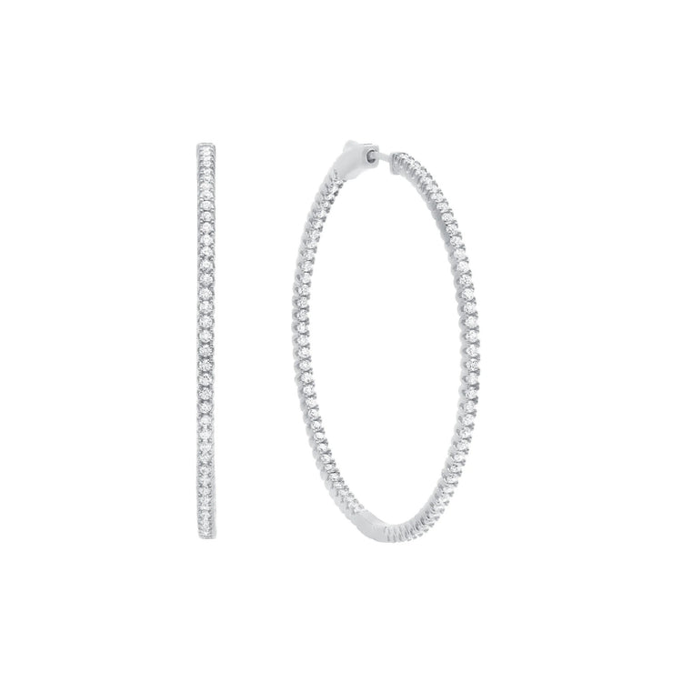 Silver hoop earrings on a white background