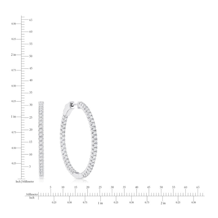 Silver hoop earring with measurement scale on a white background