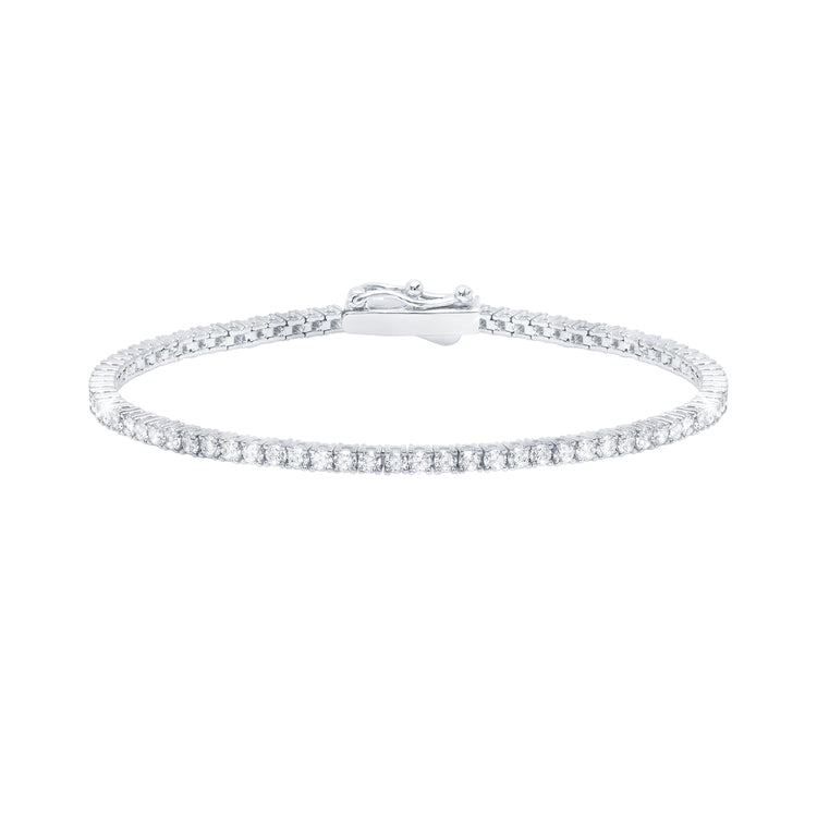 Silver bracelet with clear stones on a white background