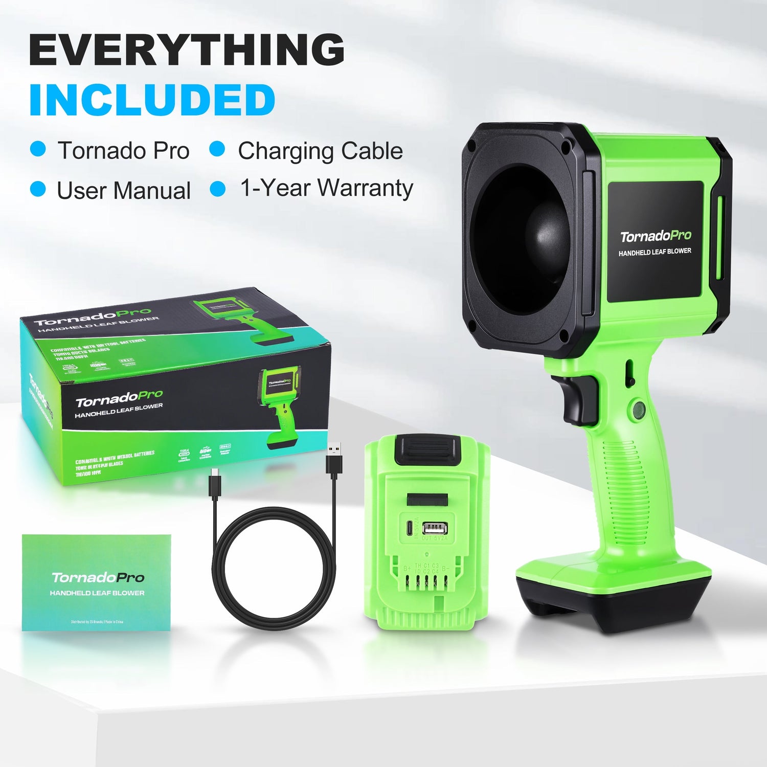 Green handheld leaf blower with packaging, charging cable, and user manual on a white background