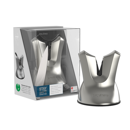 A black, professional knife sharpener with a suction cup base and a metallic blade.