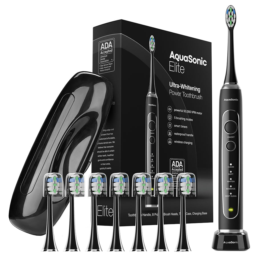 AquaSonic Elite electric toothbrush set with packaging, brush heads, and charging base on a white background.