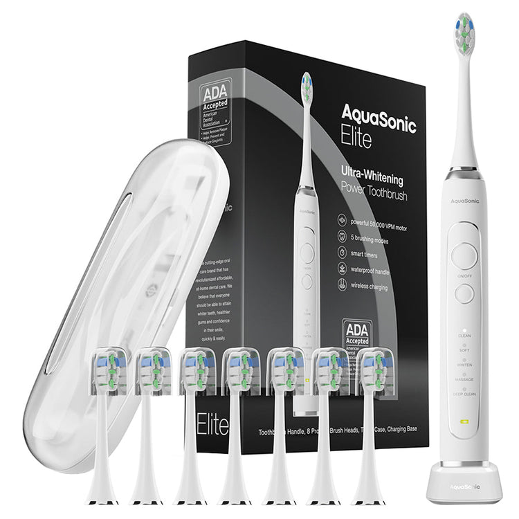 AquaSonic Elite power toothbrush set with packaging, brush heads, and travel case on a white background.