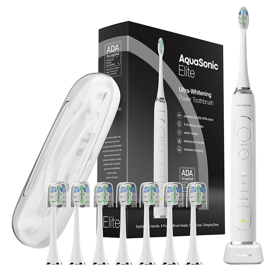 AquaSonic Elite power toothbrush set with packaging, brush heads, and travel case on a white background.