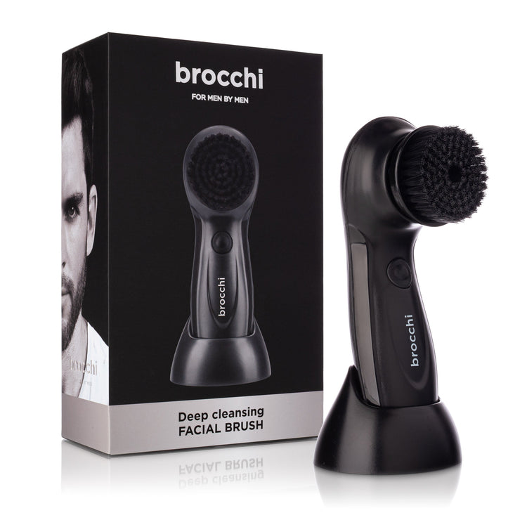 Black facial cleansing brush with packaging displaying 'brocchi' branding on a white background.