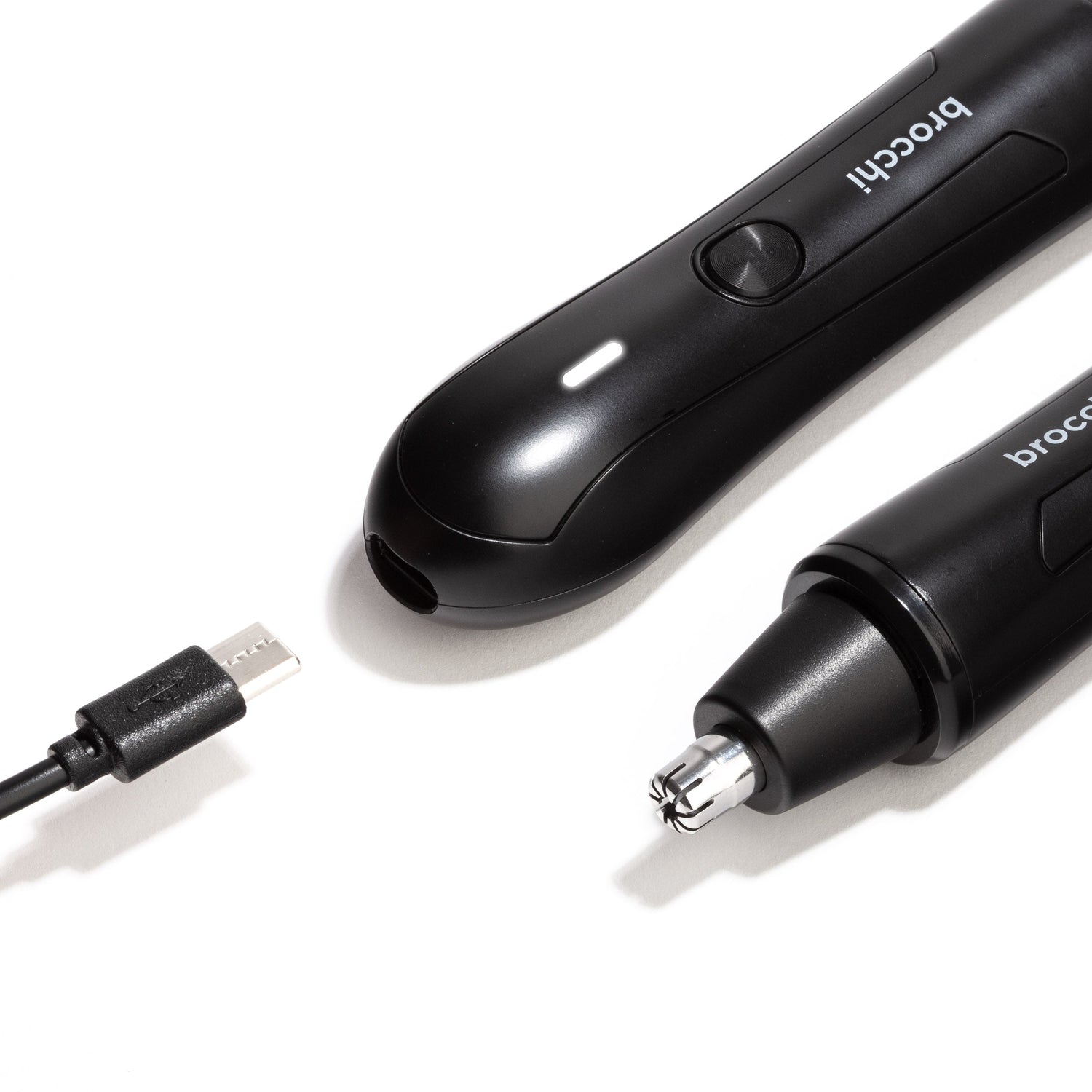 Black electric trimmer with USB cable on a white background