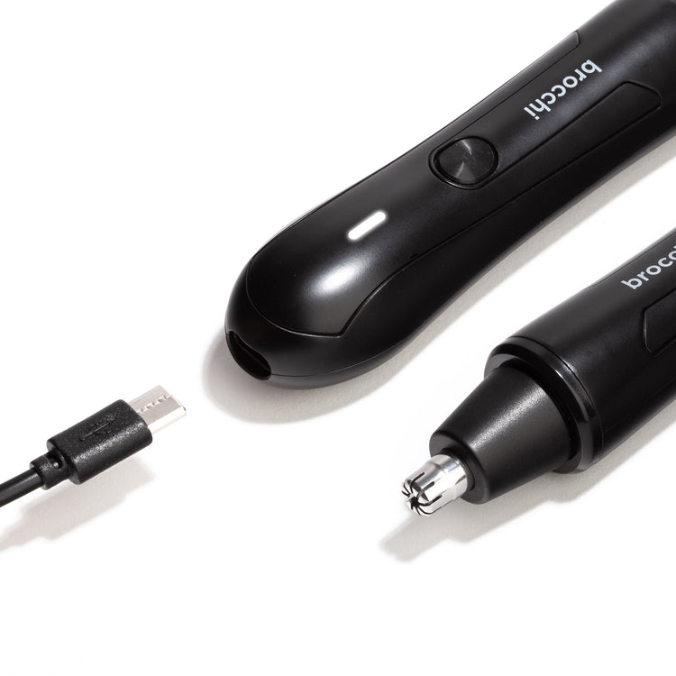 Black electric trimmer with USB cable on a white background