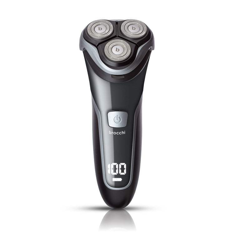 Black and silver electric shaver with digital display on a white background
