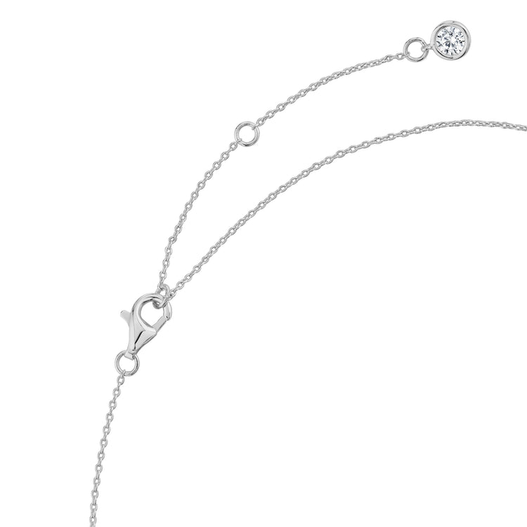 Silver necklace with a clasp on a white background