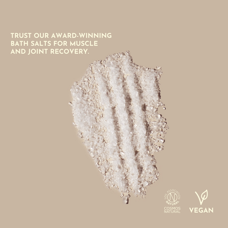 Bath salts for muscle and joint recovery on a beige background with text and logos.