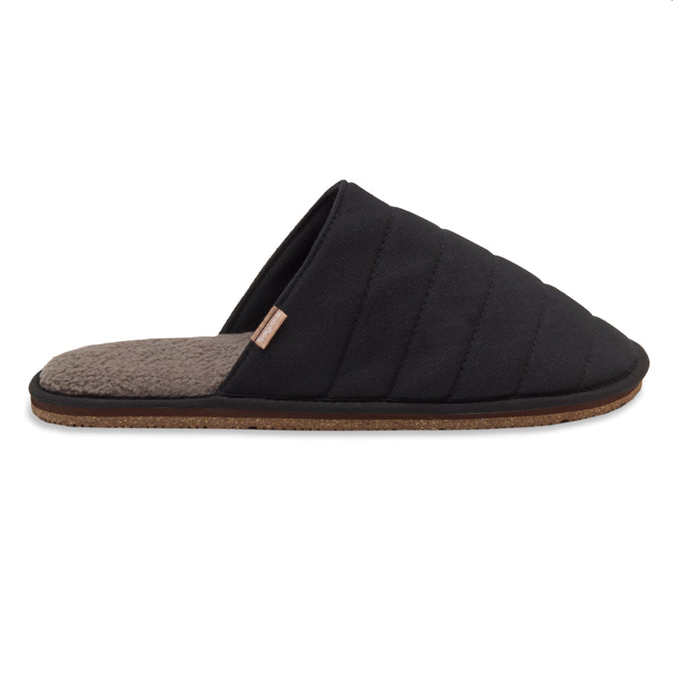Black quilted slipper with brown interior on a white background